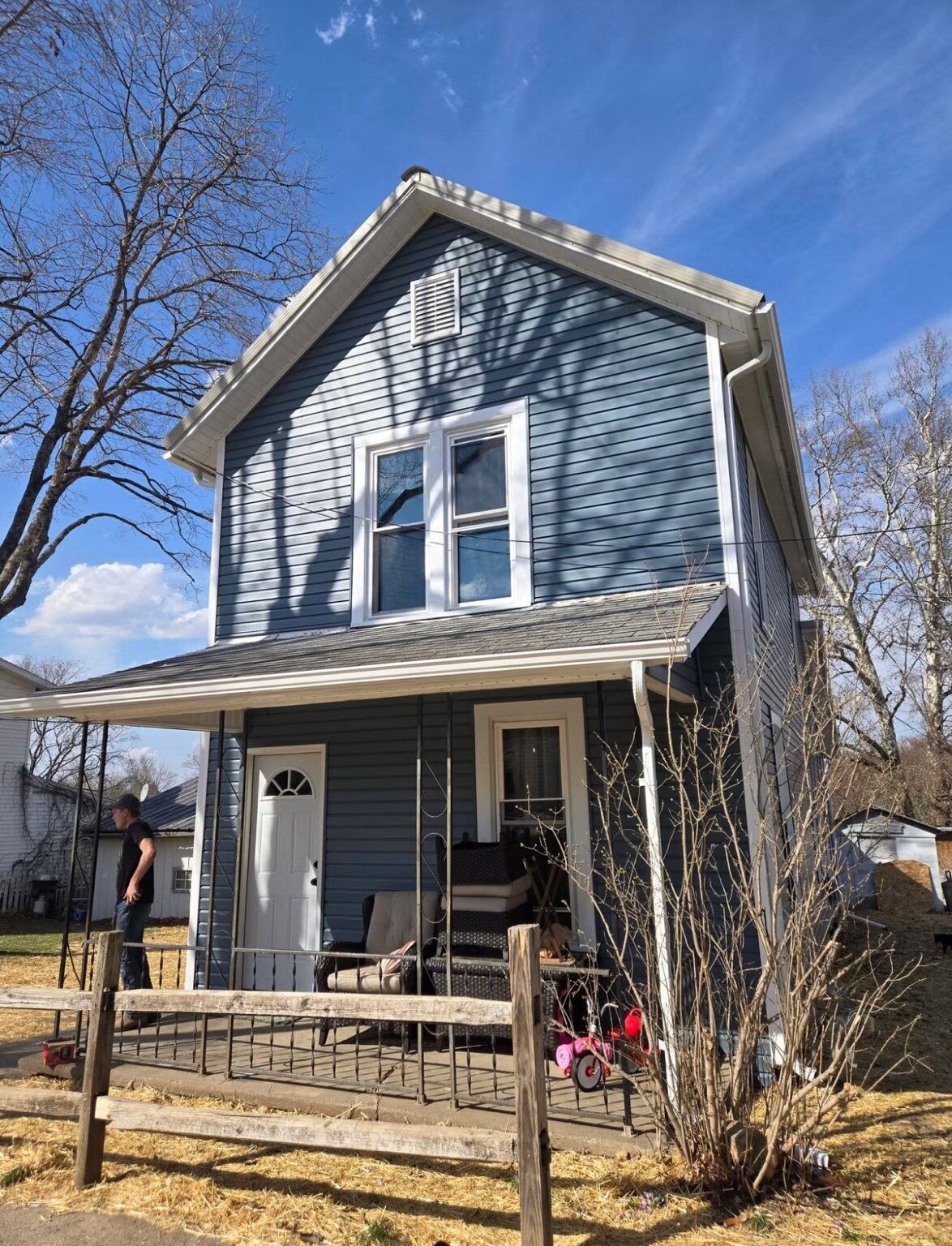 Completed blue siding and white trim project